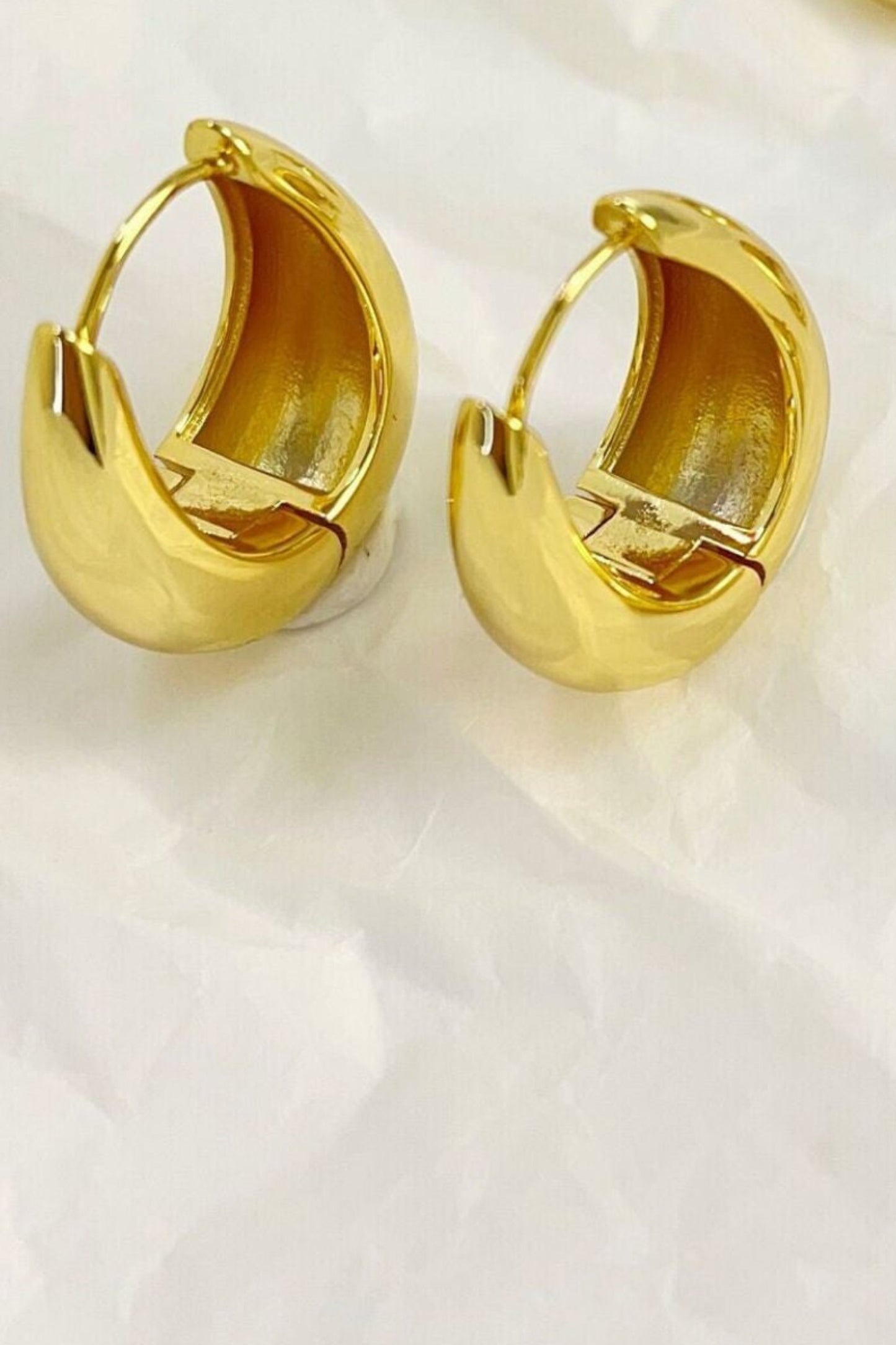chunky-hoops-in-gold-various-sizes-closeup