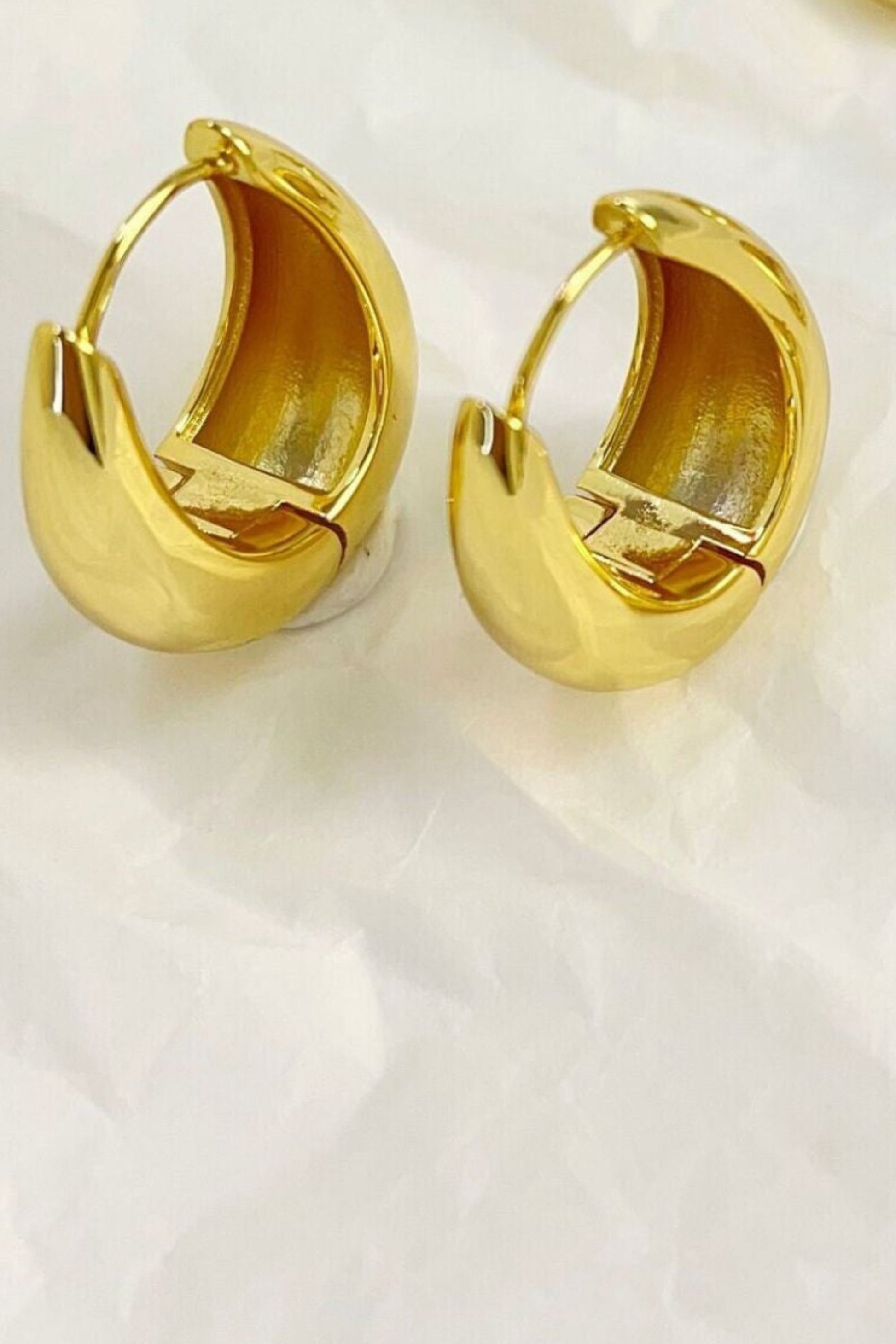 chunky-hoops-in-gold-various-sizes-closeup