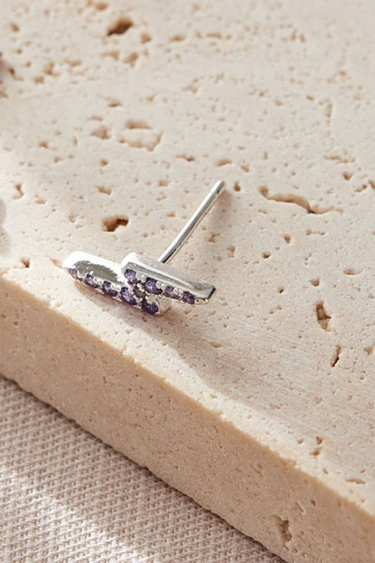 sterling-silver-cz-lightning-bolt-studs-in-silver-purple-closeup