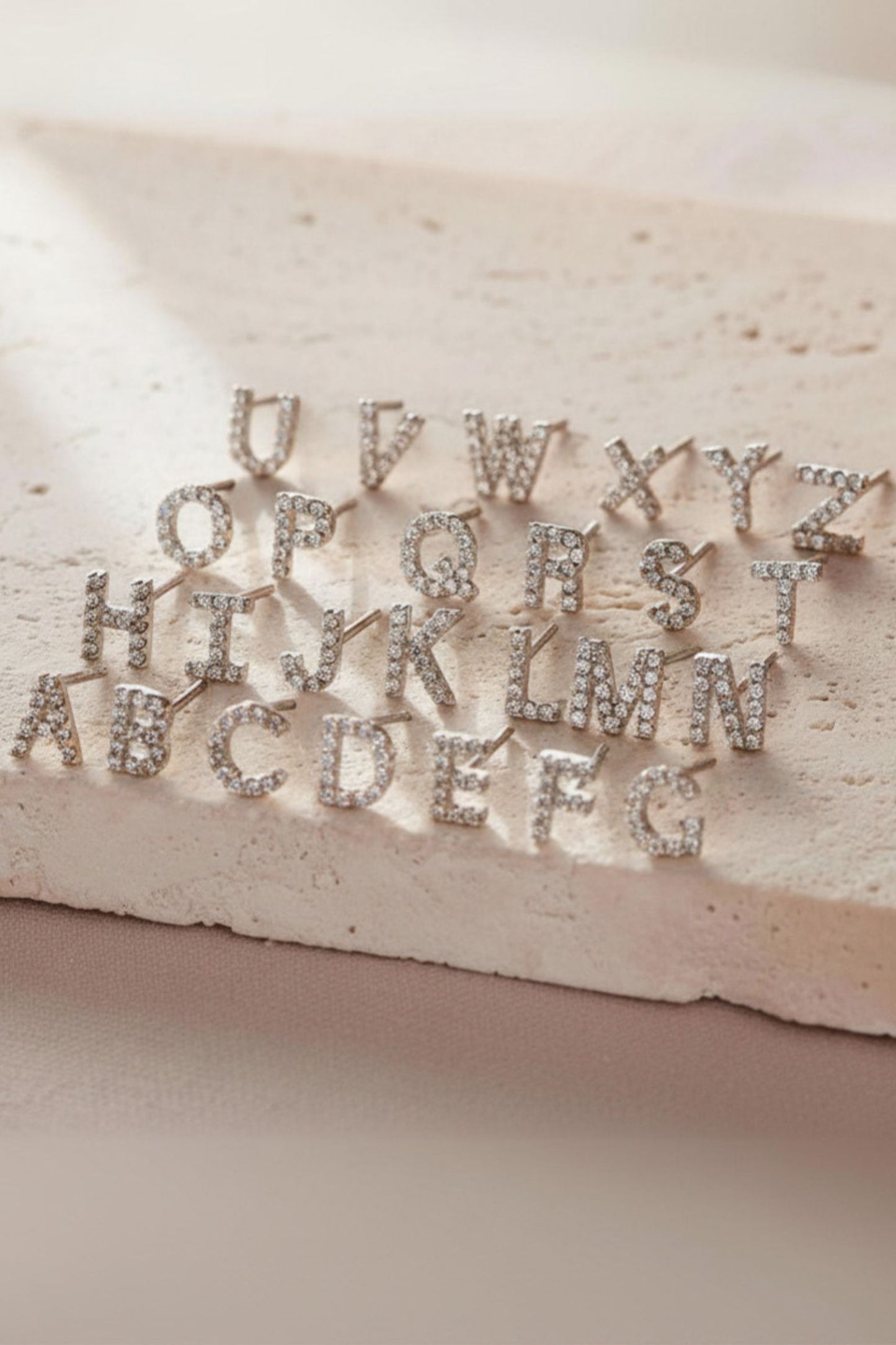 sterling-silver-cz-alphabet-studs-in-silver-single-earrings