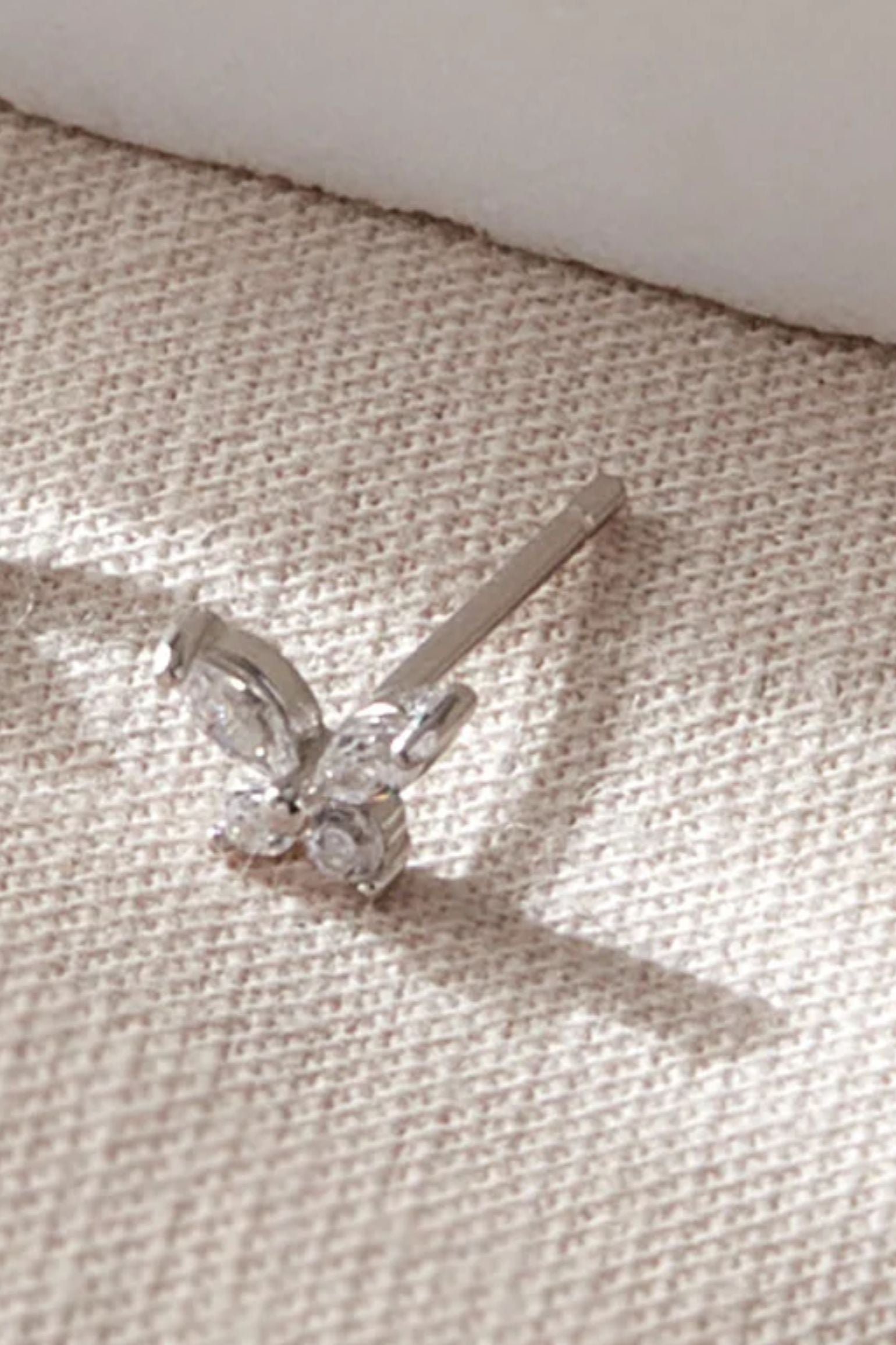 sterling-silver-cz-butterfly-studs-in-silver-closeup