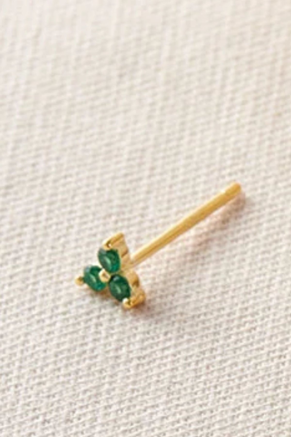 sterling-silver-cz-tiny-studs-in-gold-green-closeup