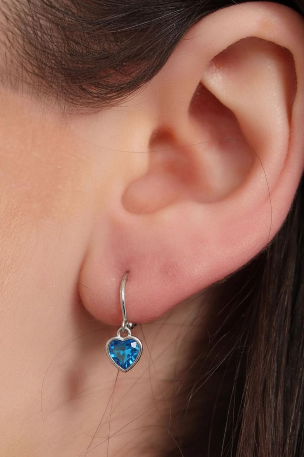sterling-silver-cz-heart-hoops-in-silver-light-blue-model