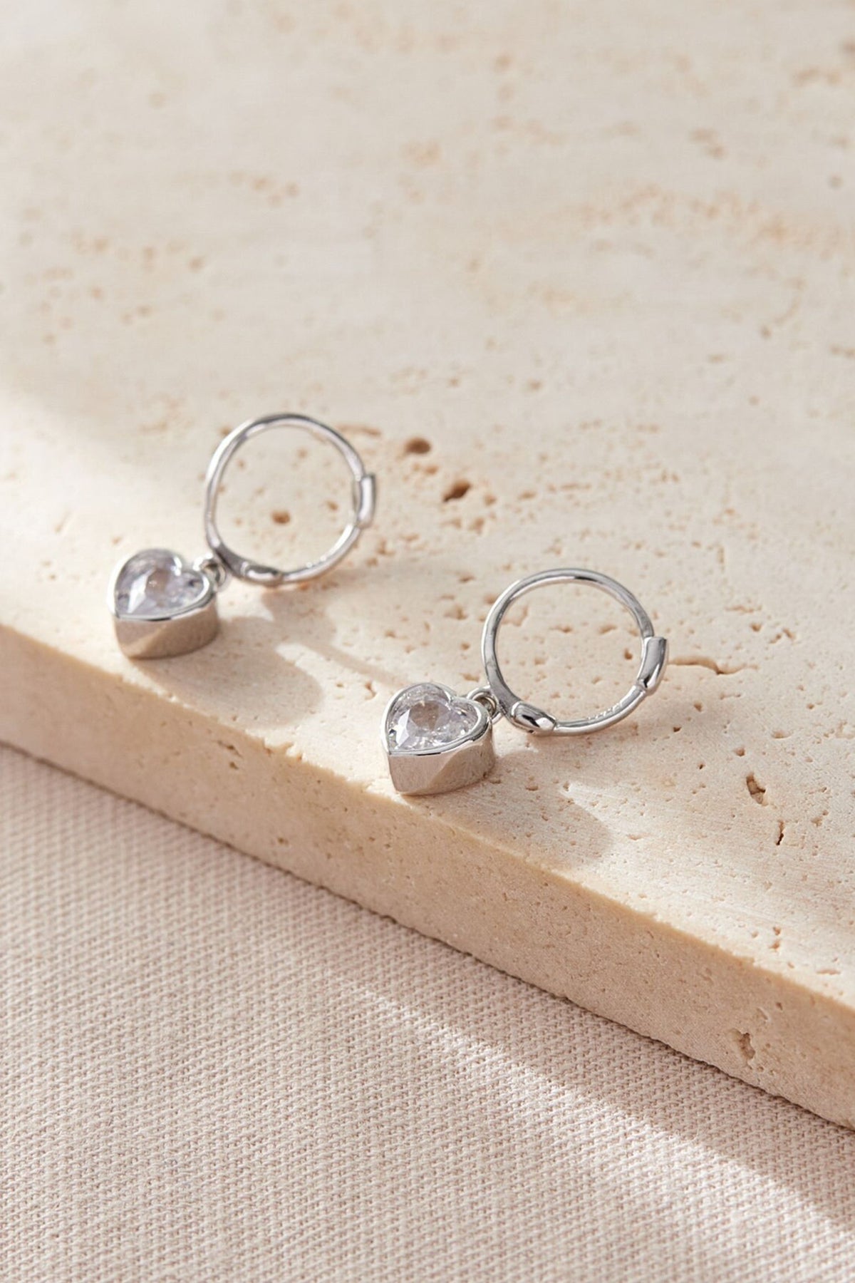 sterling-silver-cz-heart-hoops-in-silver-white