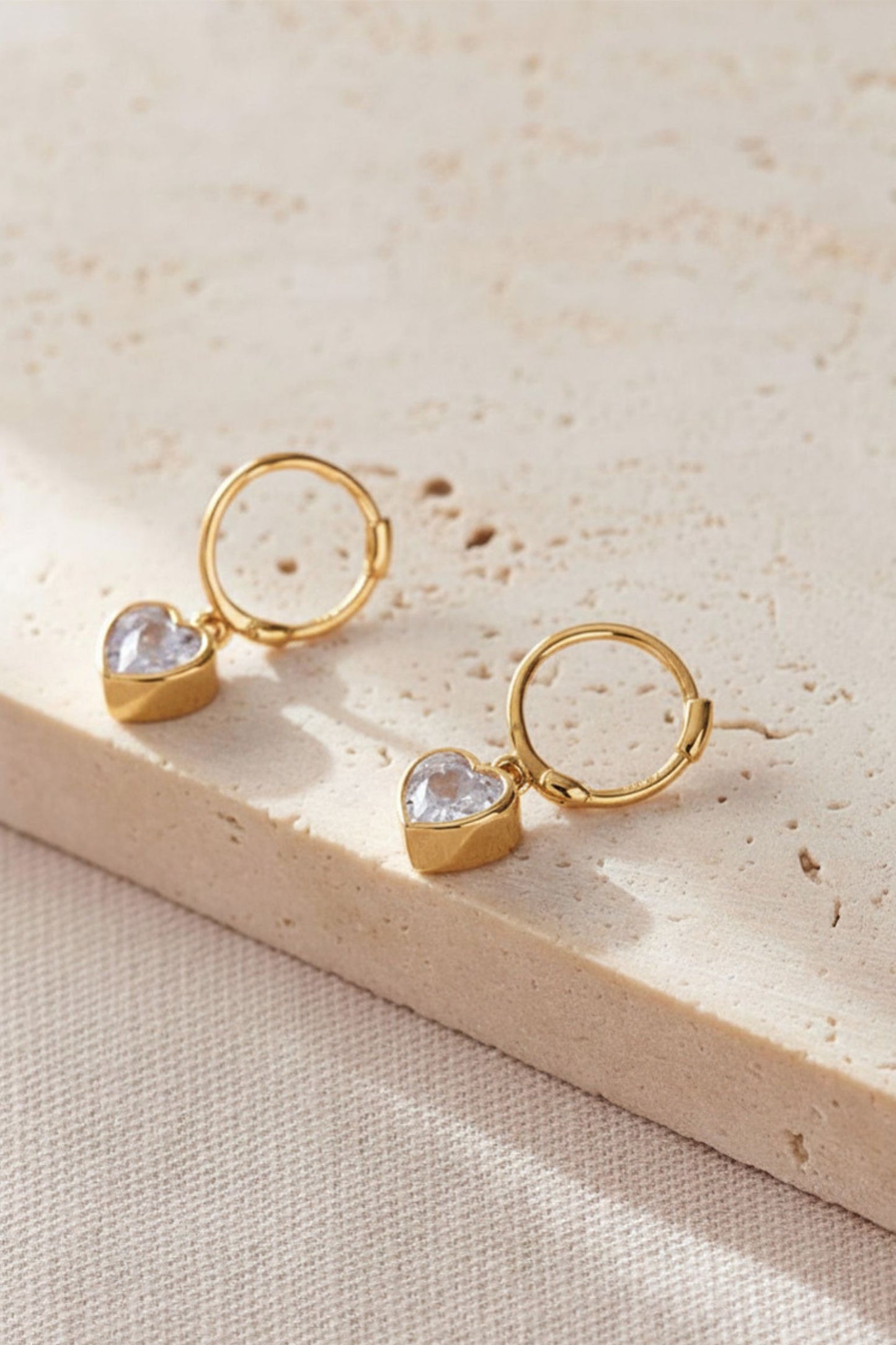 
sterling-silver-cz-heart-hoops-in-gold-white
