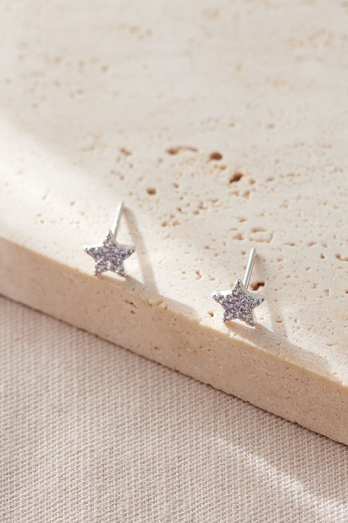 sterling-silver-sparkly-star-studs-in-silver-white