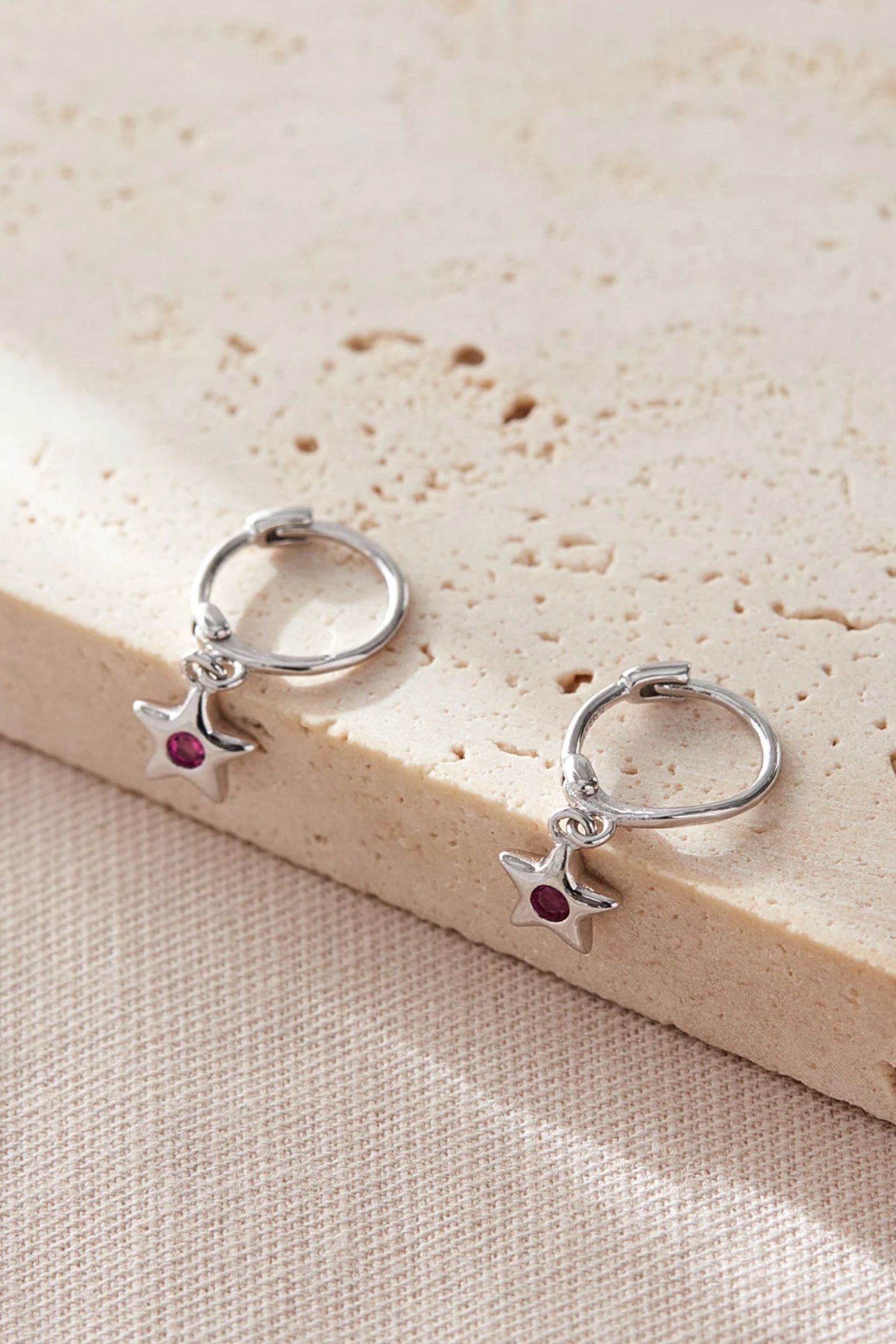 sterling-silver-cz-star-hoops-in-silver-fuchsia