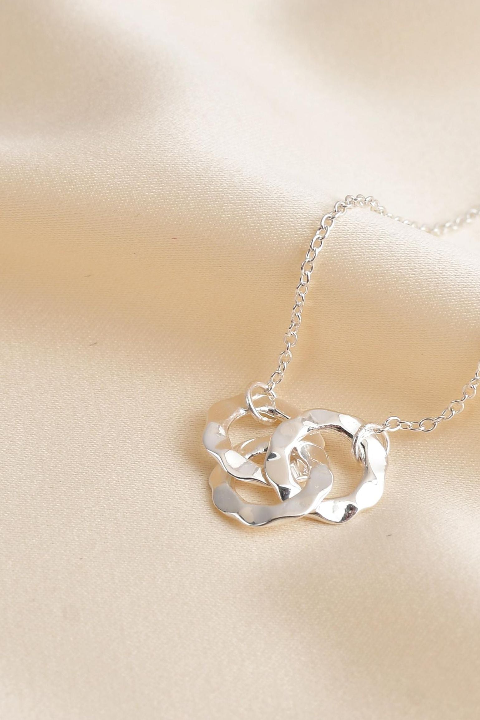 sterling-silver-hammered-circle-trio-bracelet-closeup