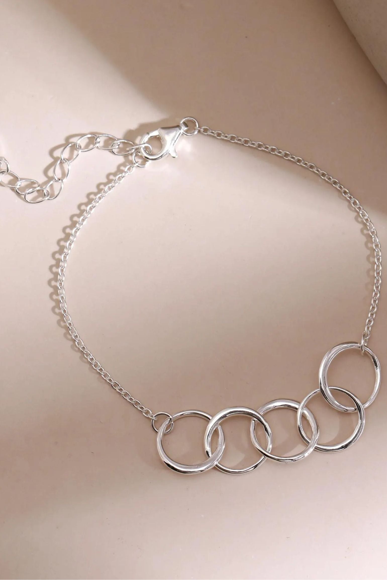 sterling-silver-five-rings-bracelet-lying-flat
