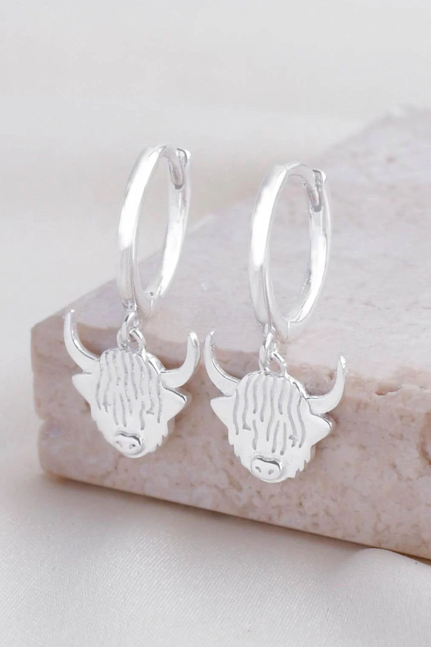 highland-cow-huggie-hoops-in-silver