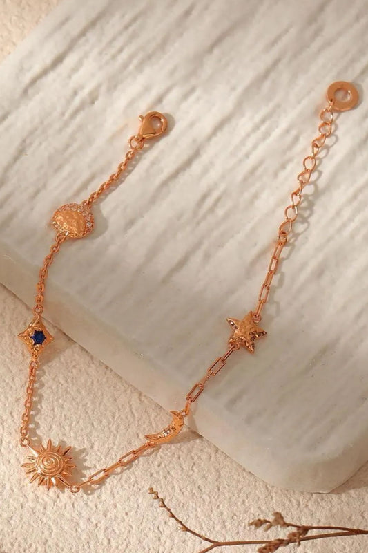 sterling-silver-sun-moon-star-charm-bracelet-in-gold
