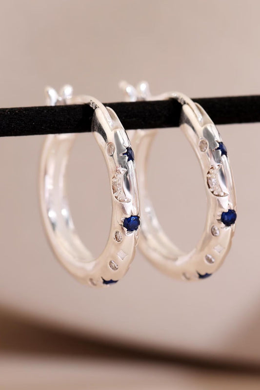 sterling-silver-engraved-celestial-hoops-in-silver-closeup