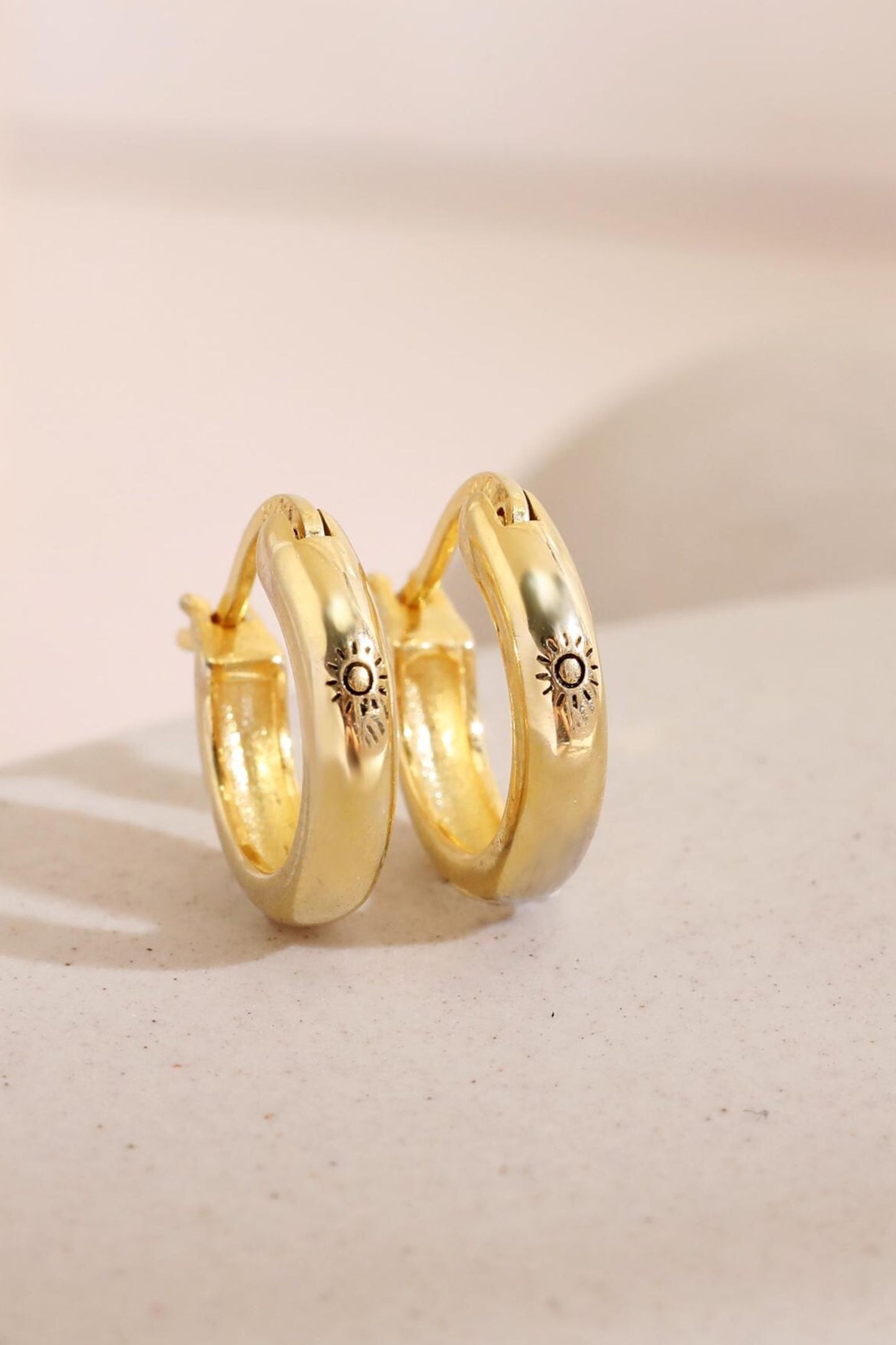 sterling-silver-engraved-sun-hoops-in-gold