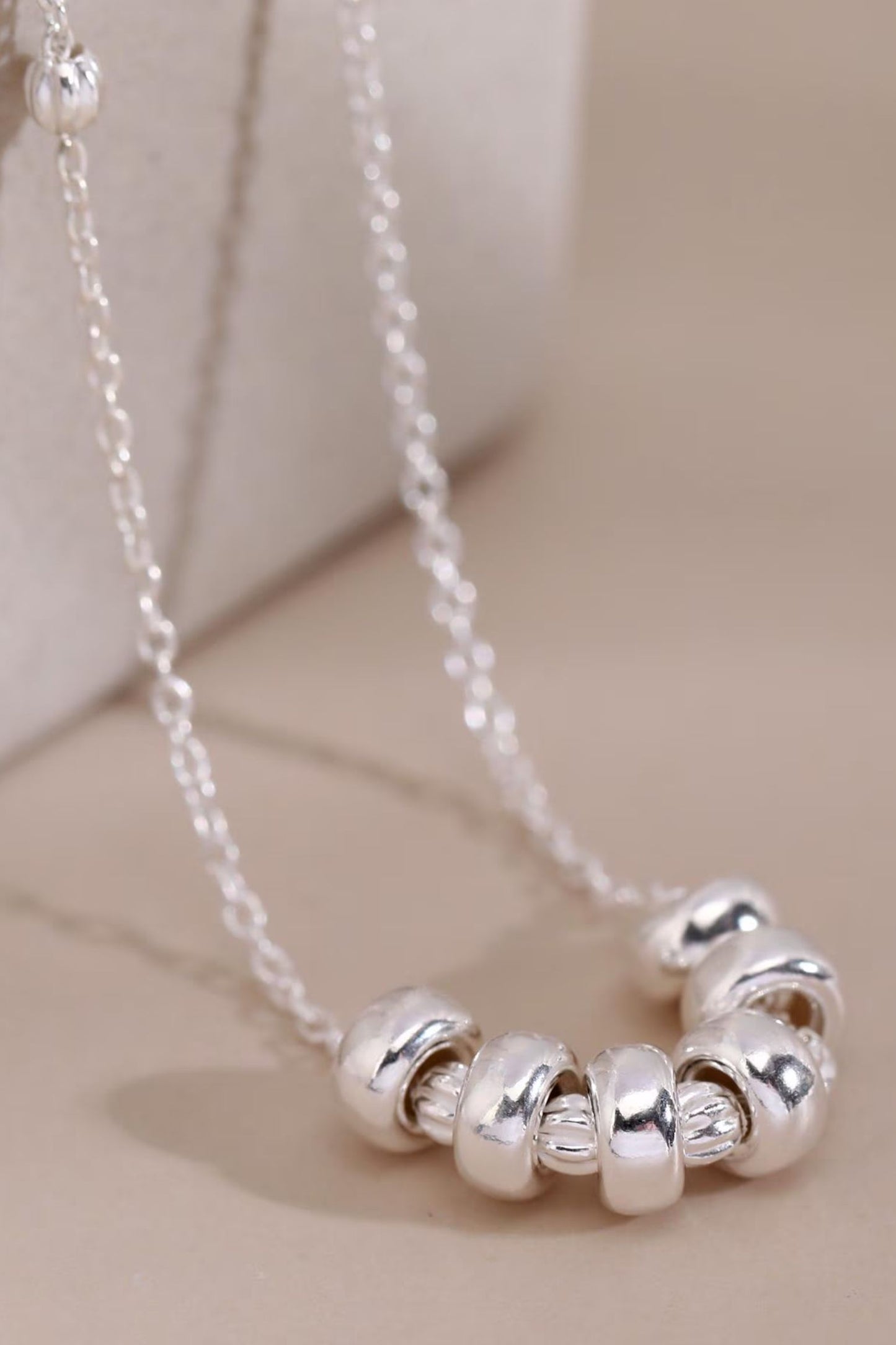 sterling-silver-beaded-circle-necklace-closeup