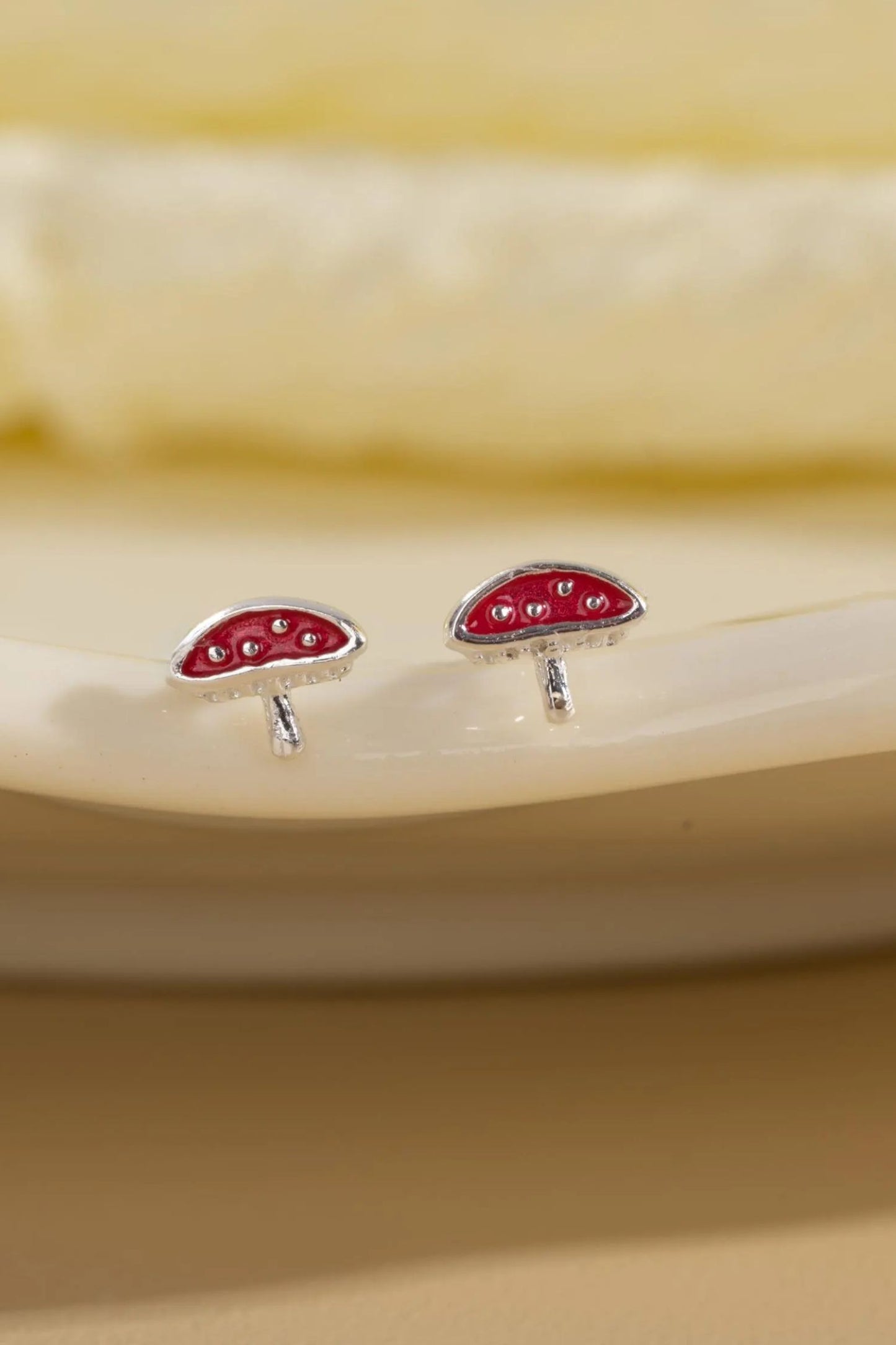 sterling-silver-red-toadstool-studs-closeup