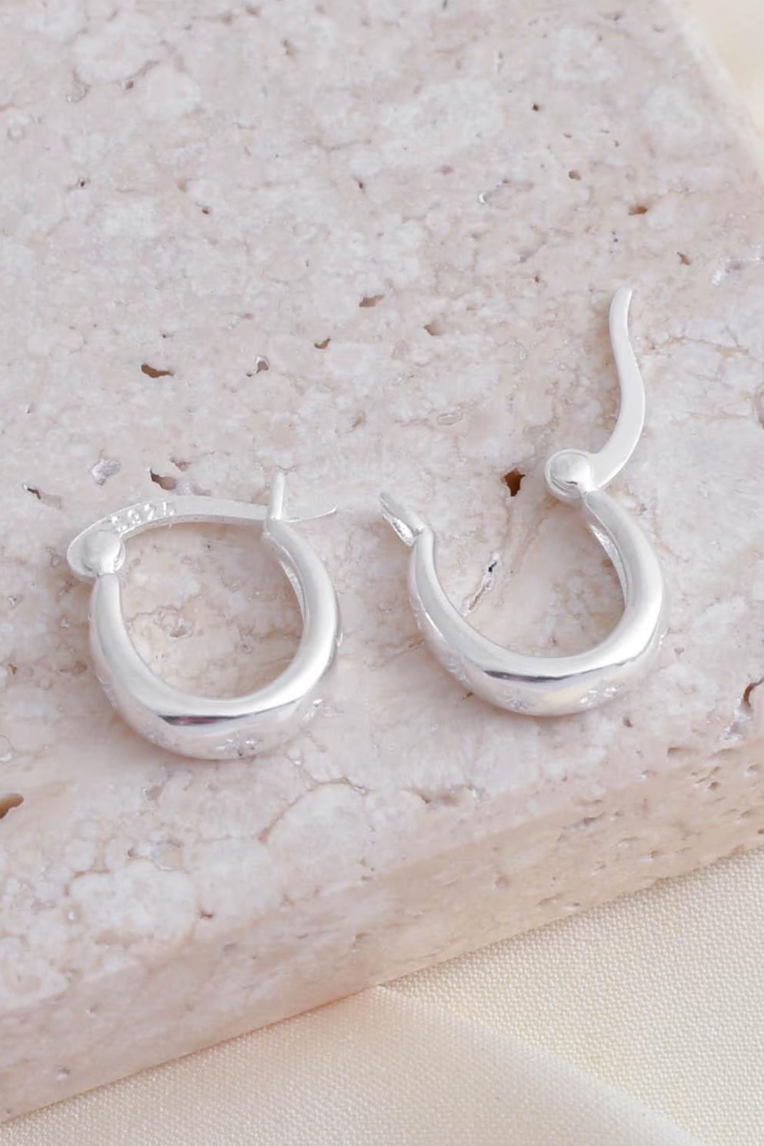 sterling-silver-engraved-starburst-hoops-in-silver-closure
