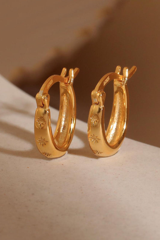 sterling-silver-engraved-starburst-hoops-in-gold