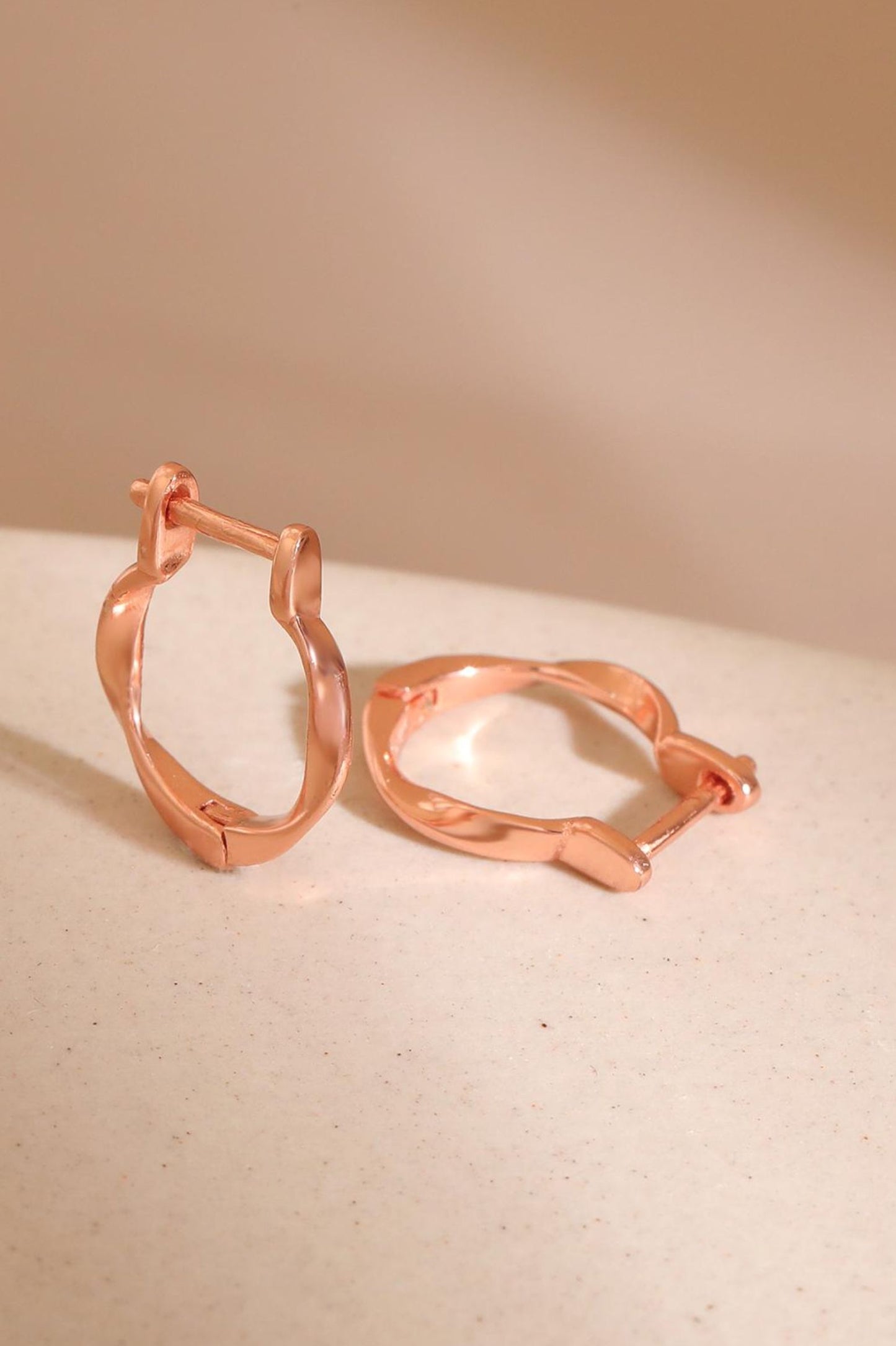 sterling-silver-twist-hoops-in-rose-gold