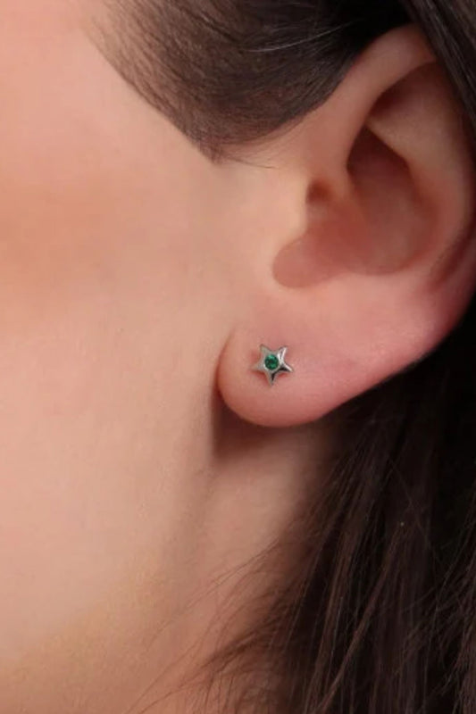 sterling-silver-dainty-cz-star-studs-in-silver-green-model