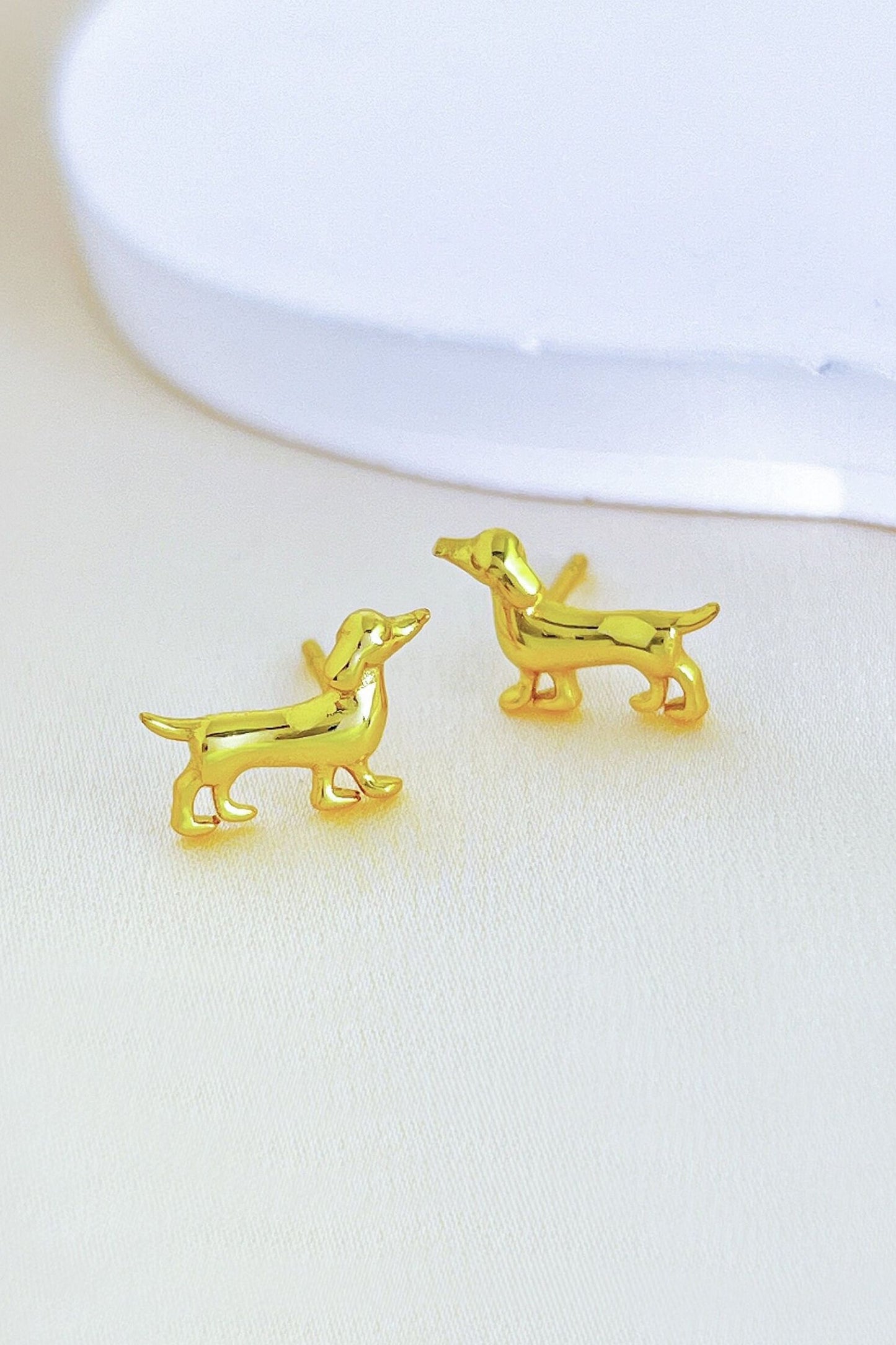 sterling-silver-sausage-dog-studs-in-gold