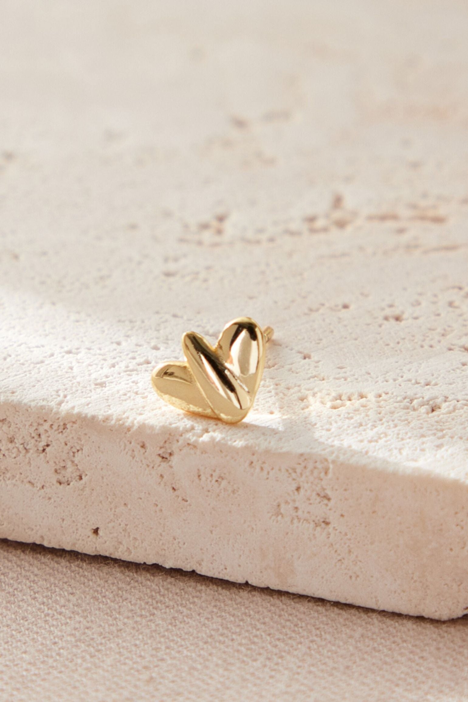 sterling-silver-mismatched-leaf-studs-in-gold-small-earring