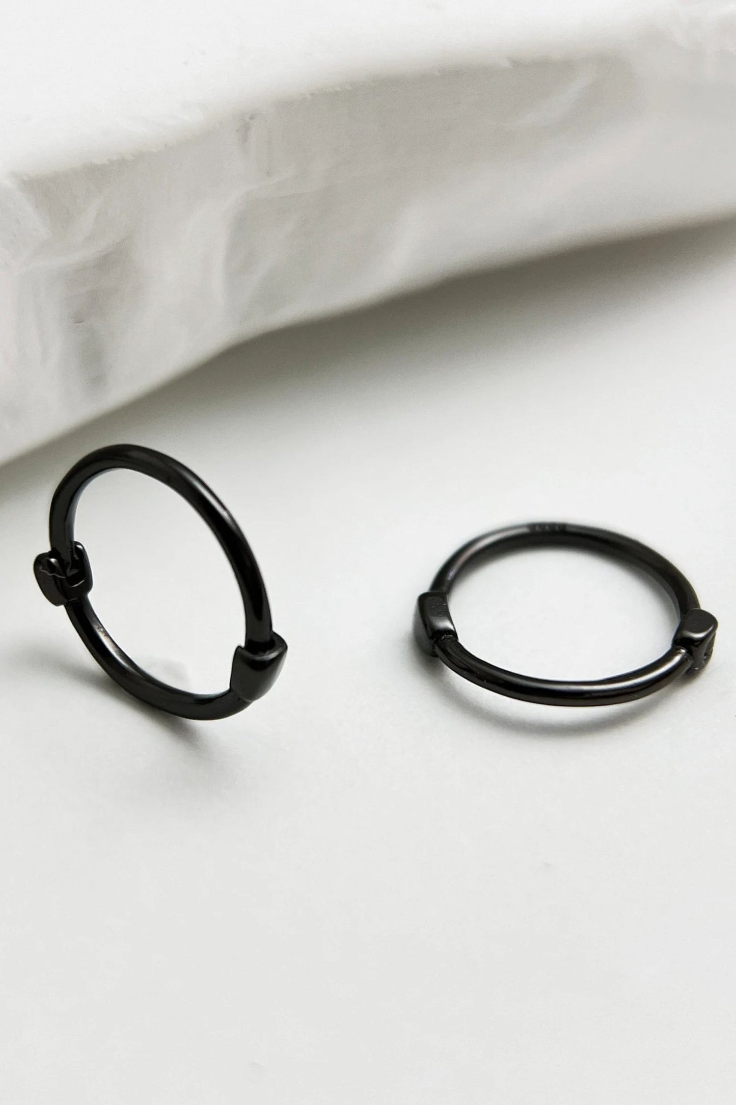 black-s999-silver-huggie-hoops