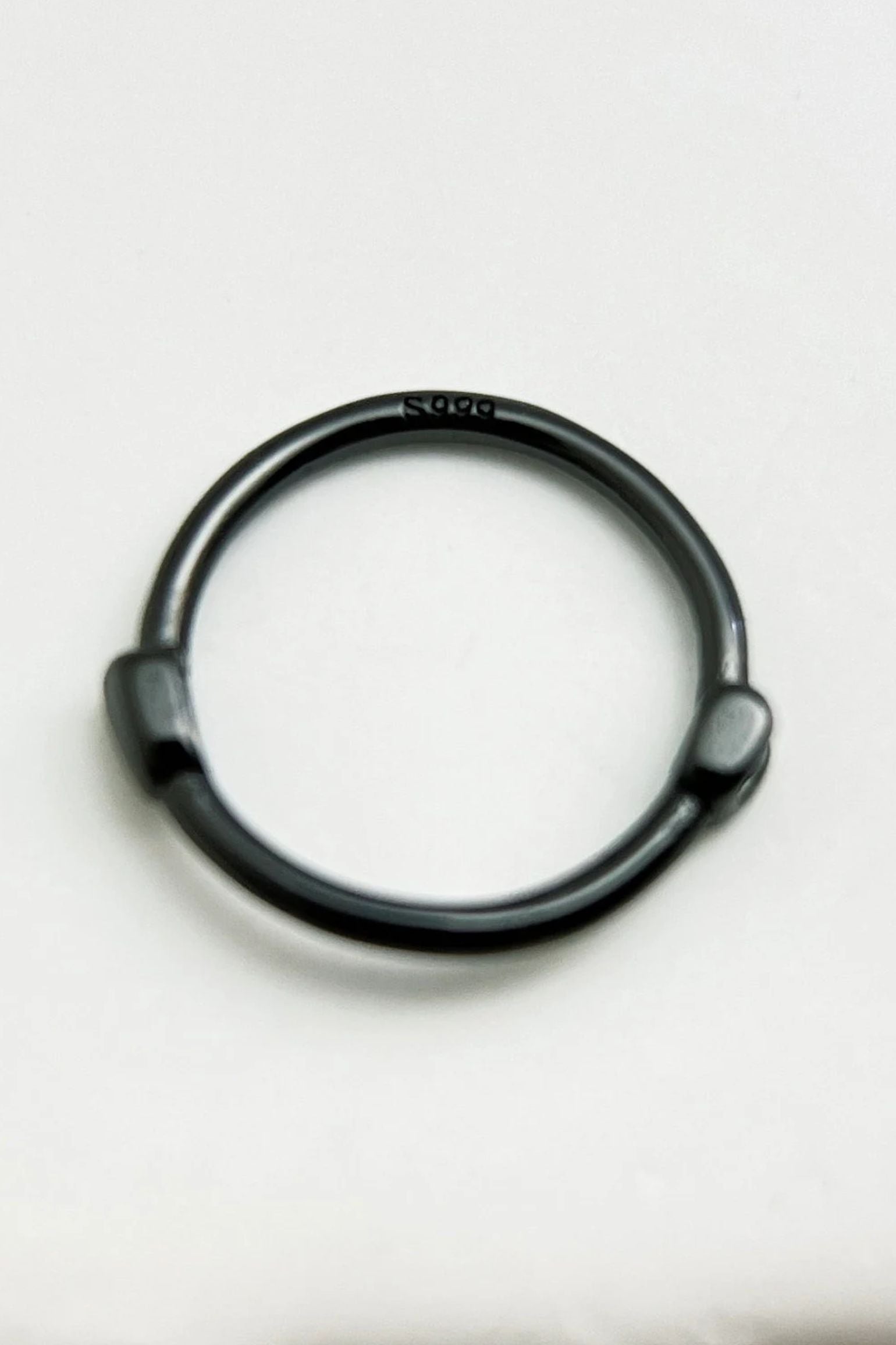 black-s999-silver-huggie-hoops-closeup-hallmark