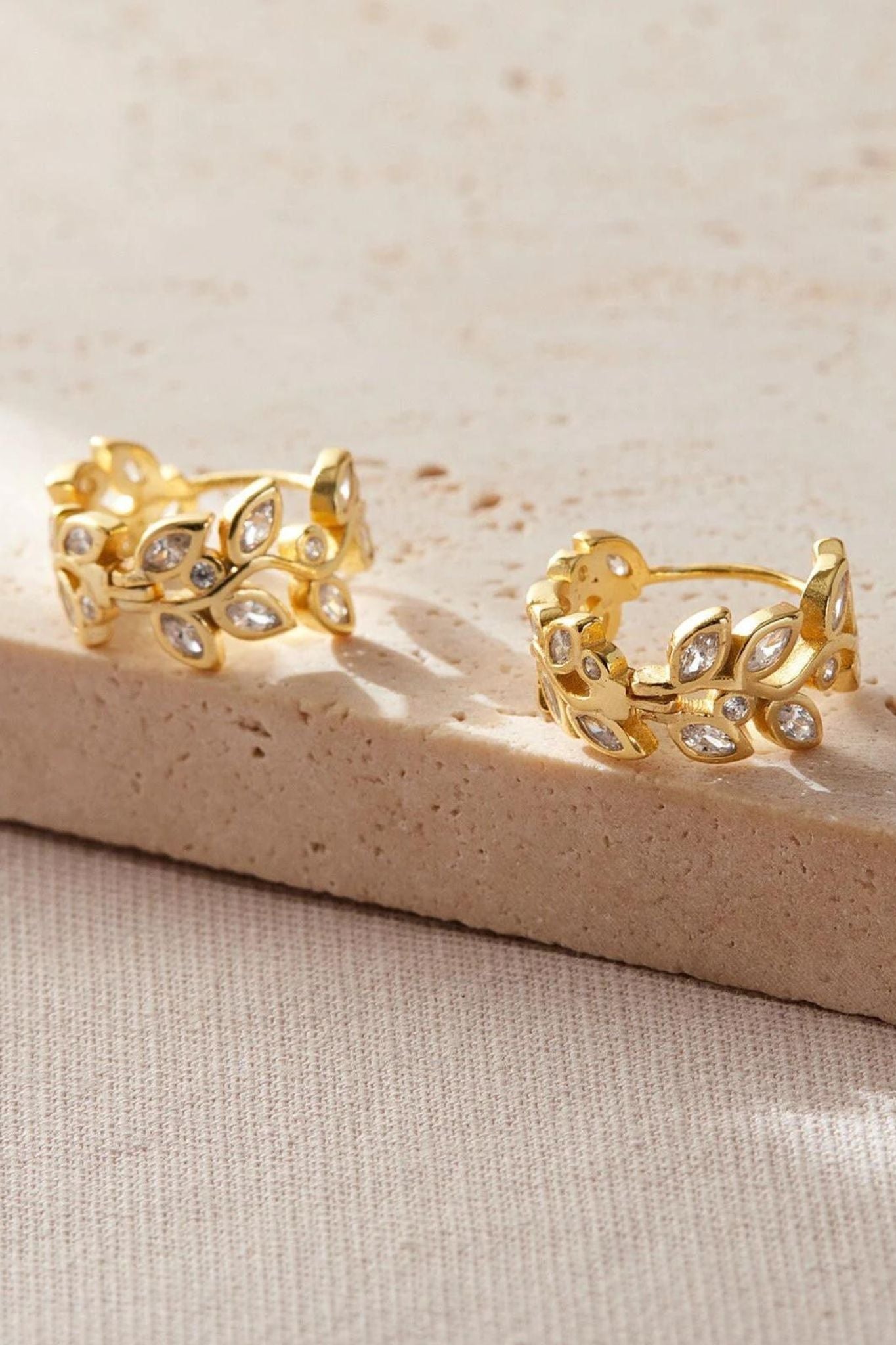sterling-silver-cz-olive-leaf-hoops-in-gold