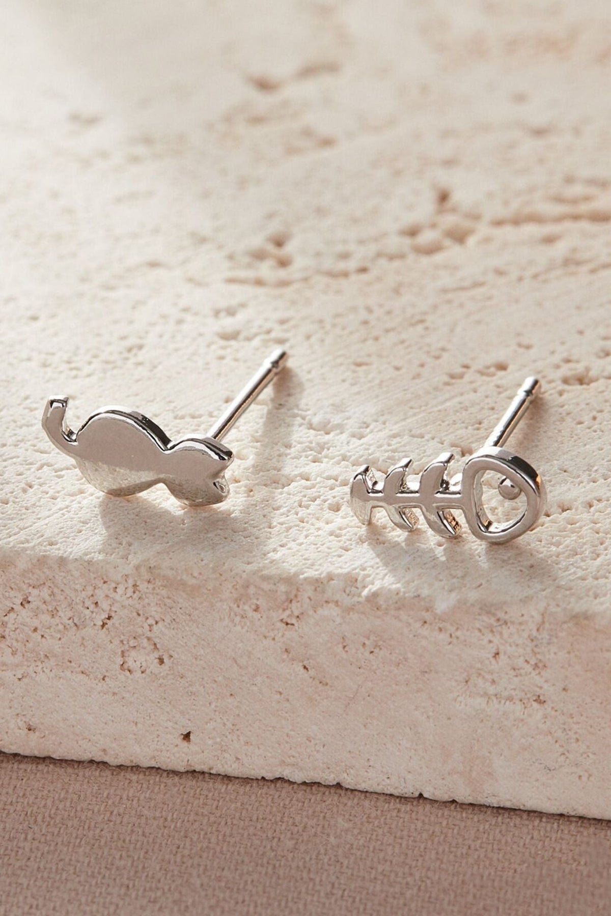 sterling-silver-mismatched-cat-fish-studs-closeup