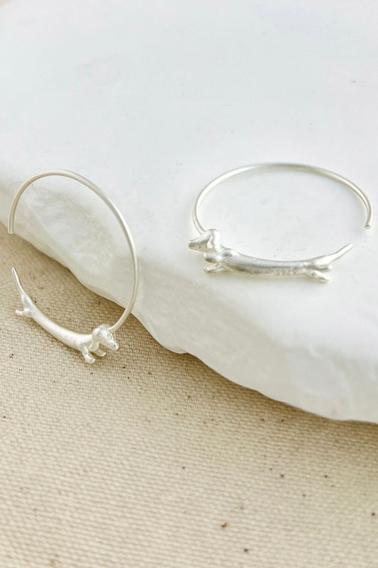sterling-silver-sausage-dog-hoops-in-silver-closeup