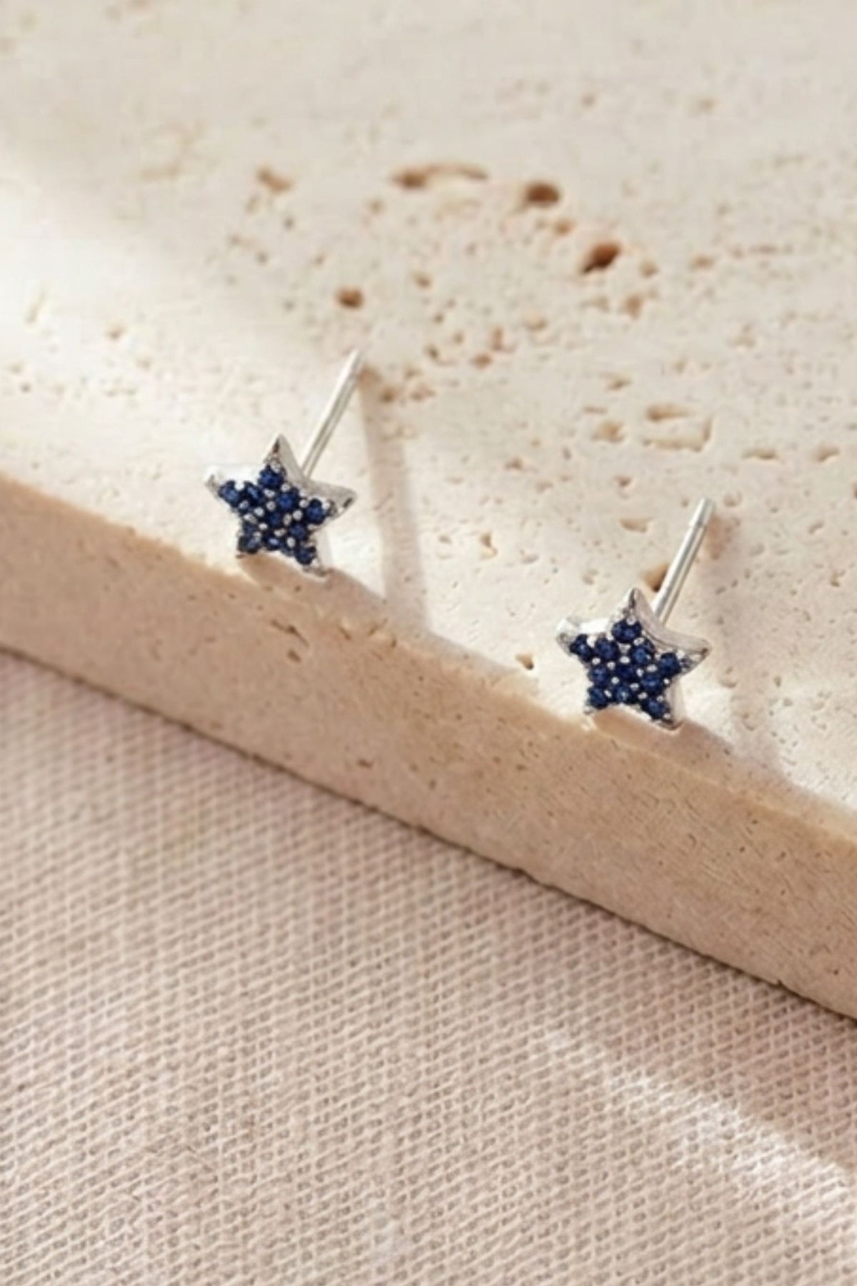 sterling-silver-sparkly-star-studs-in-silver-midnight-blue