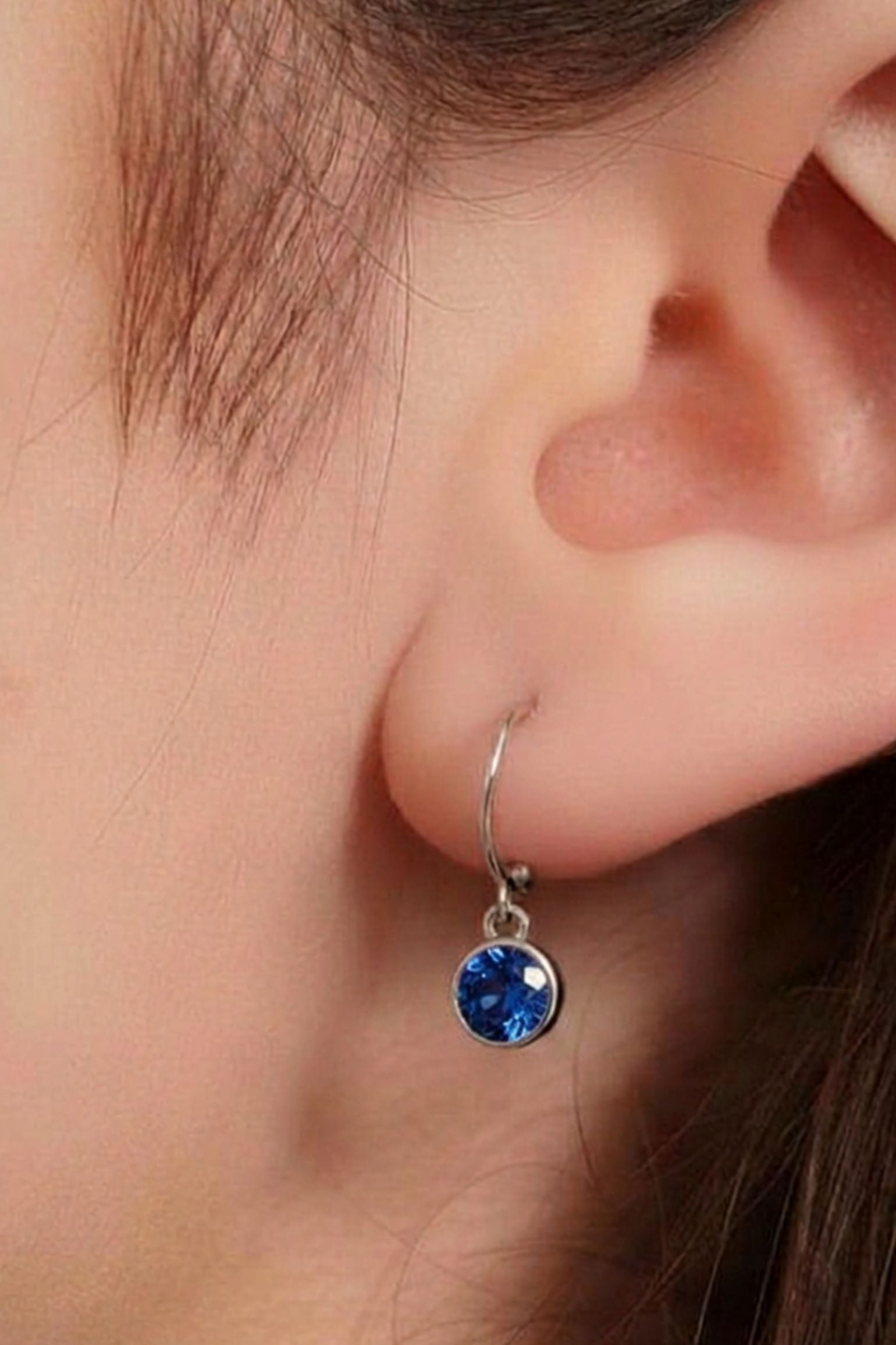 sterling-silver-cz-huggie-hoops-in-silver-blue-1-model