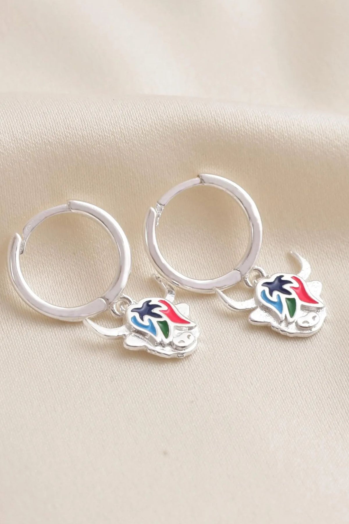 sterling-silver-colourful-highland-cow-hoops-closeup