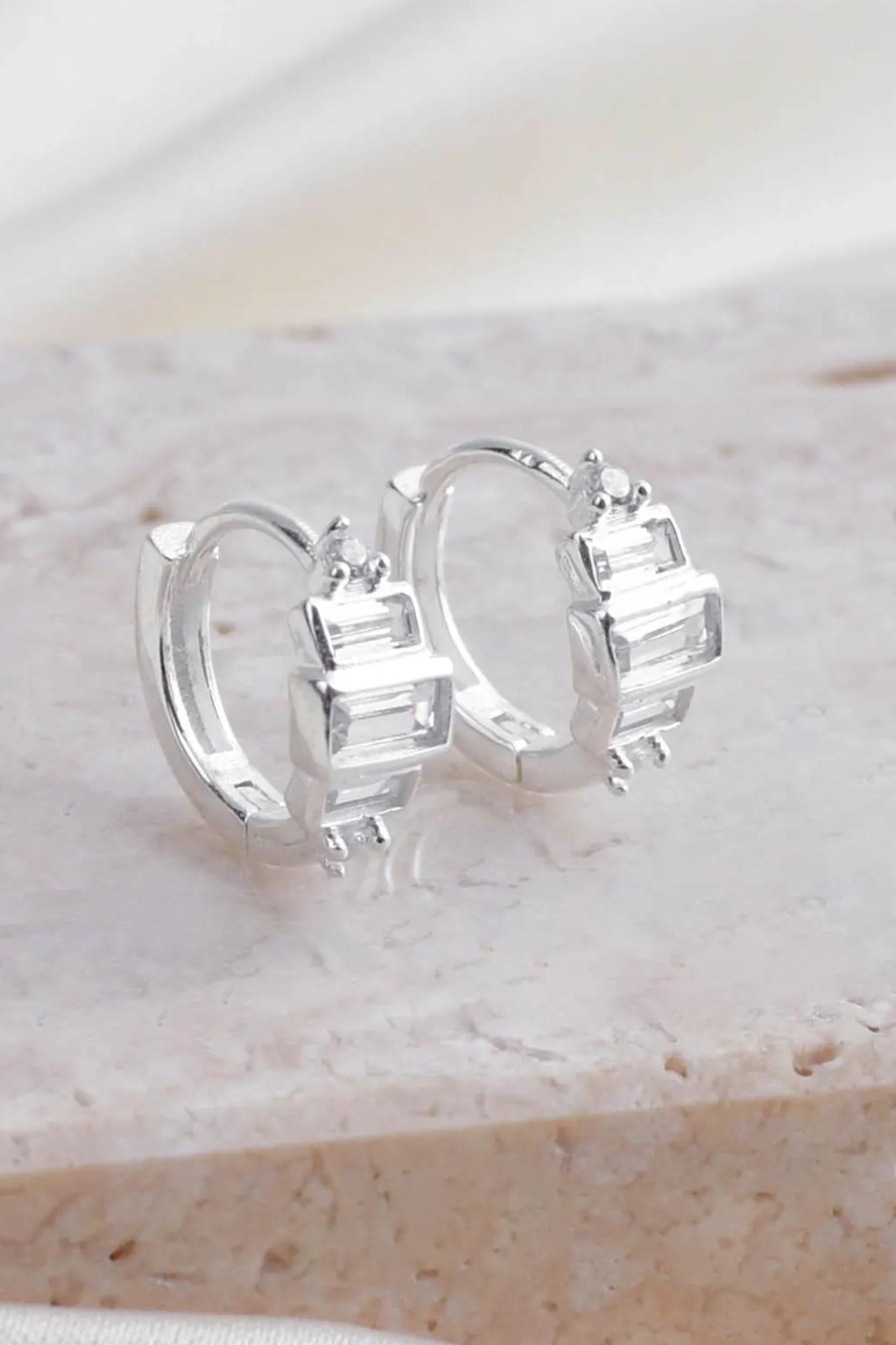 sterling-silver-cz-croissant-huggie-hoops