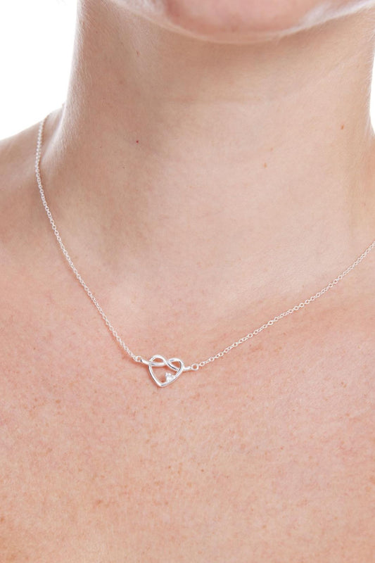 sterling-silver-cz-love-knot-necklace-wife-model-neckline