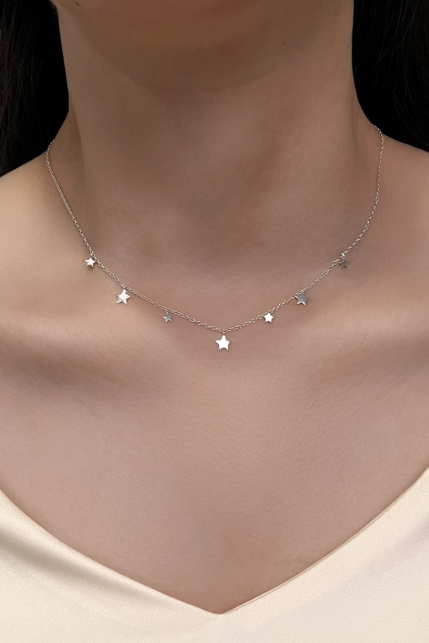 sterling-silver-star-charm-necklace-model-neckline