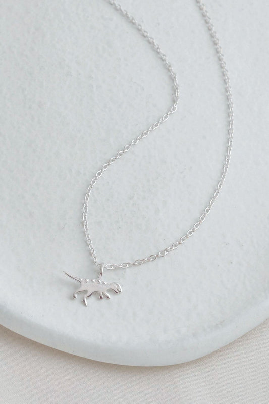 sterling-silver-t-rex-dinosaur-necklace-lying-flat