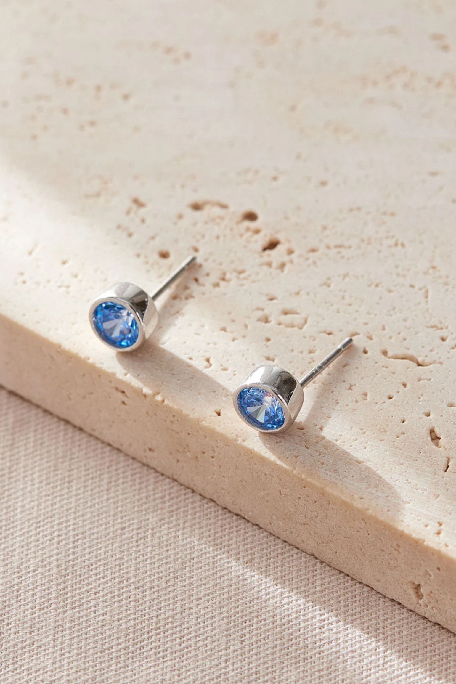sterling-silver-cz-round-studs-in-silver-light-blue