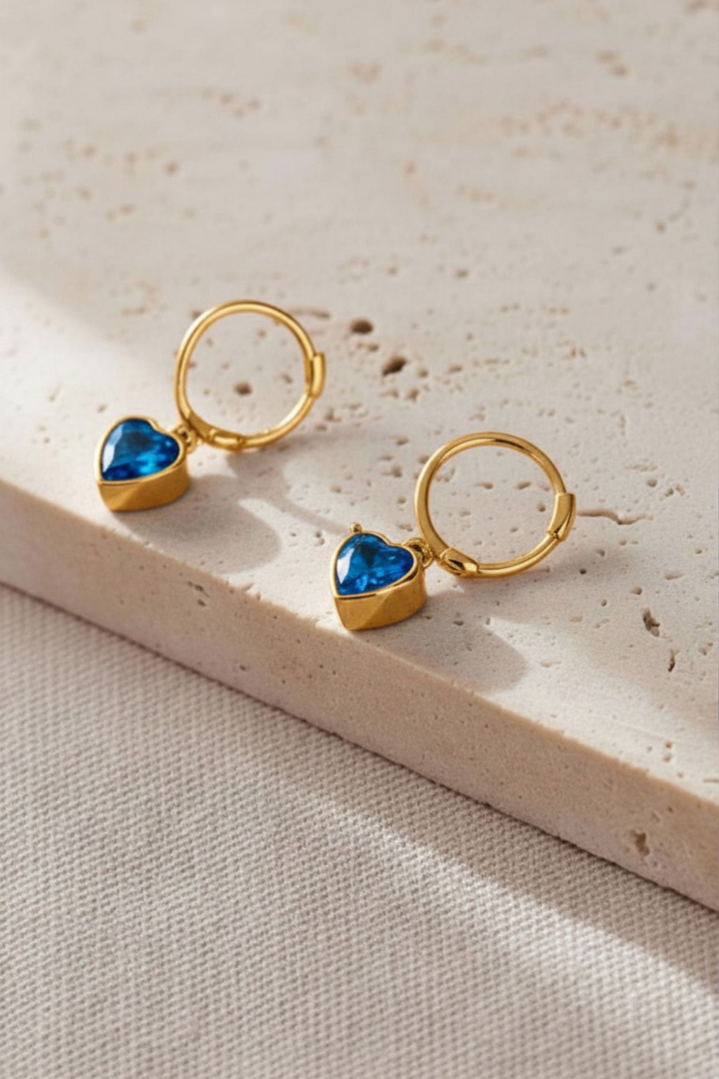 sterling-silver-cz-heart-hoops-in-gold-blue