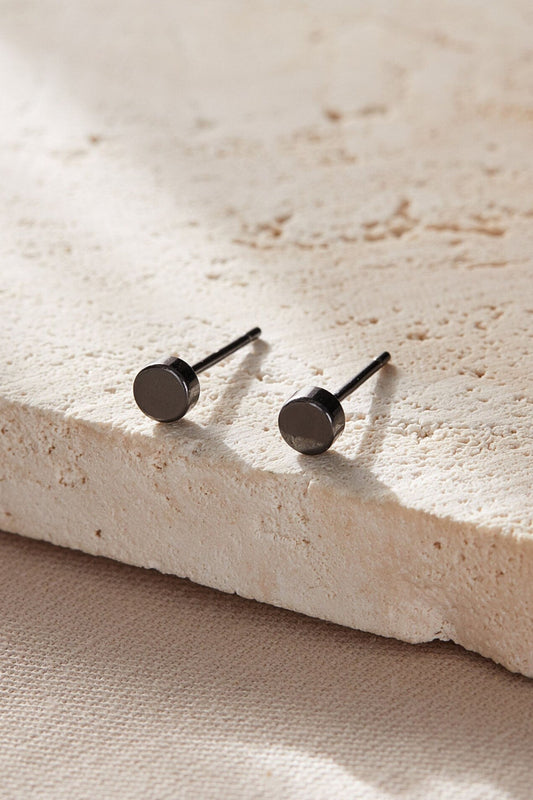 sterling-silver-tiny-disc-studs-in-black