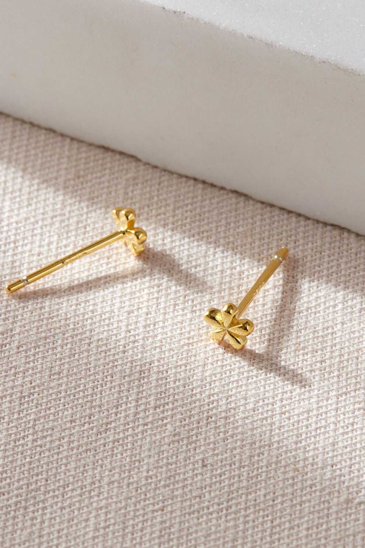sterling-silver-dainty-floral-studs-4mm-in-gold-pair