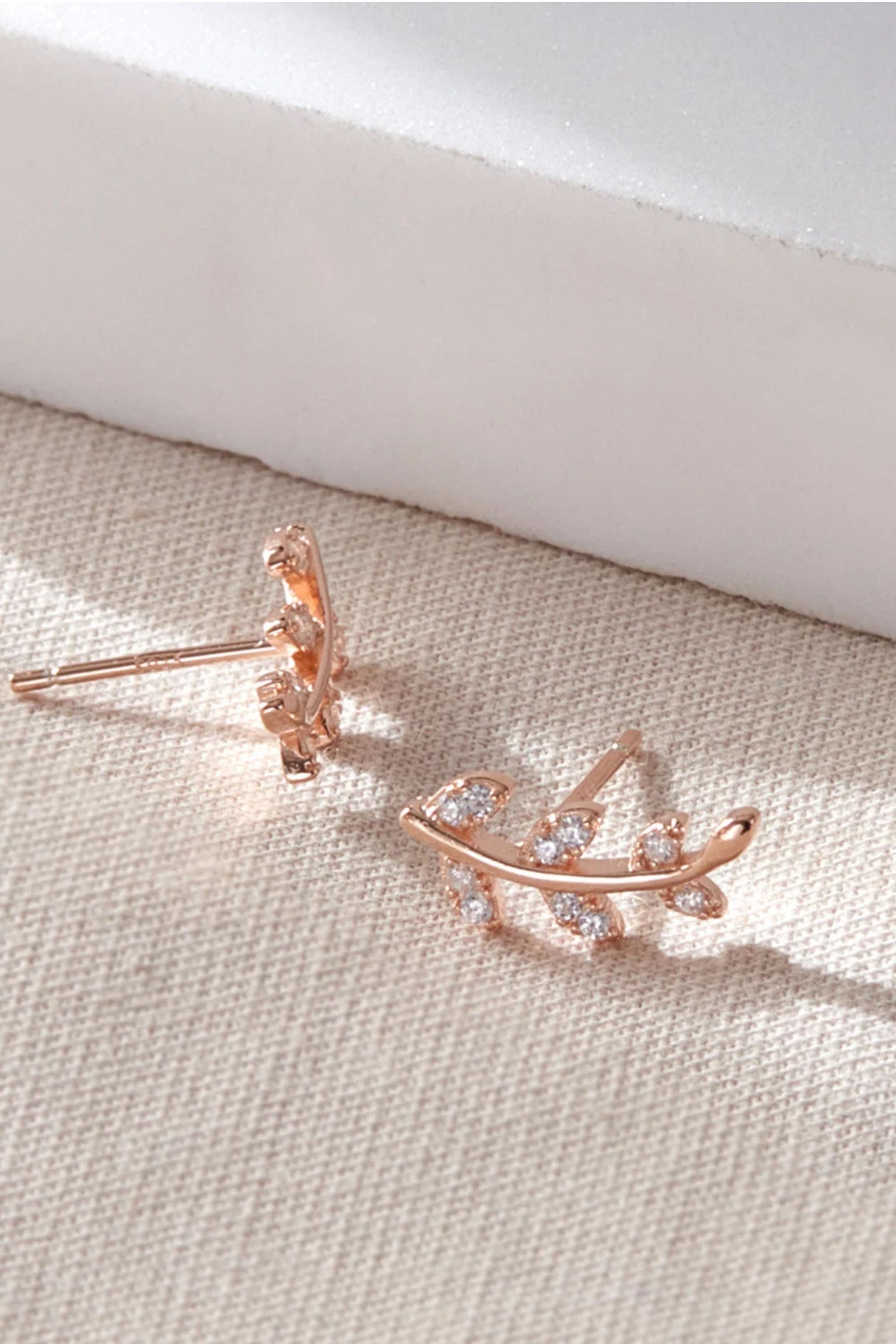 sterling-silver-cz-sparkly-leaf-studs-in-rose-gold-closeup