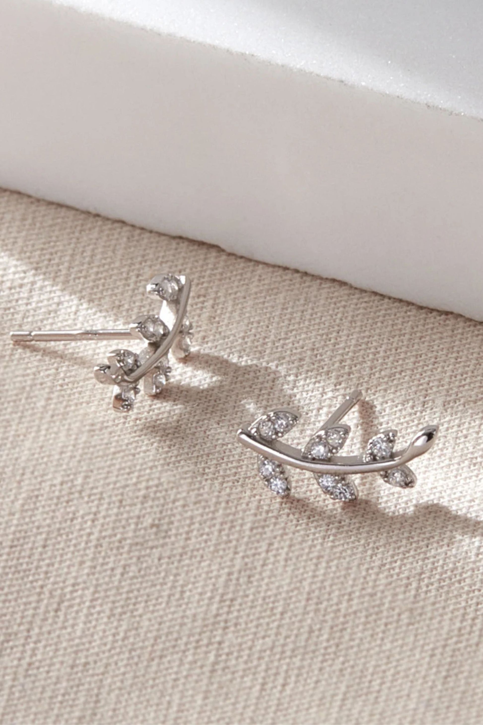 sterling-silver-cz-sparkly-leaf-studs-in-silver-closeup